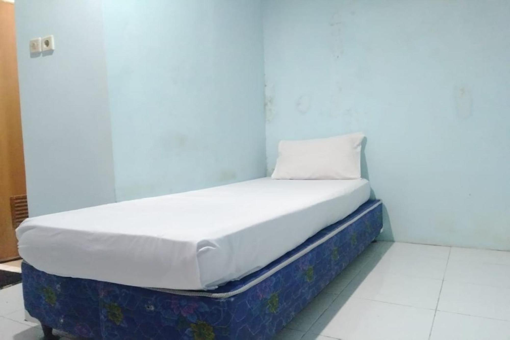 Hotel Oyo 90766 Gardenia Boarding House à Purwokerto Extérieur photo